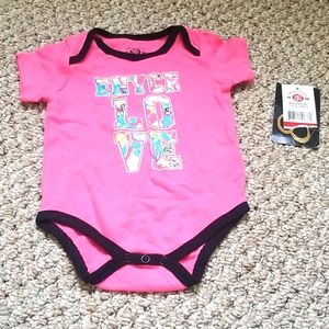 New! With tags. Enyce oneie size 6 to 9 months